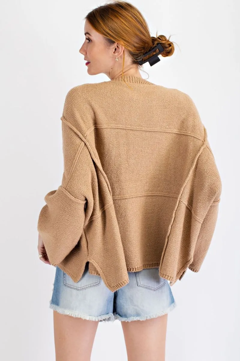 Oversized wide sleeve sweater with rounded neckline